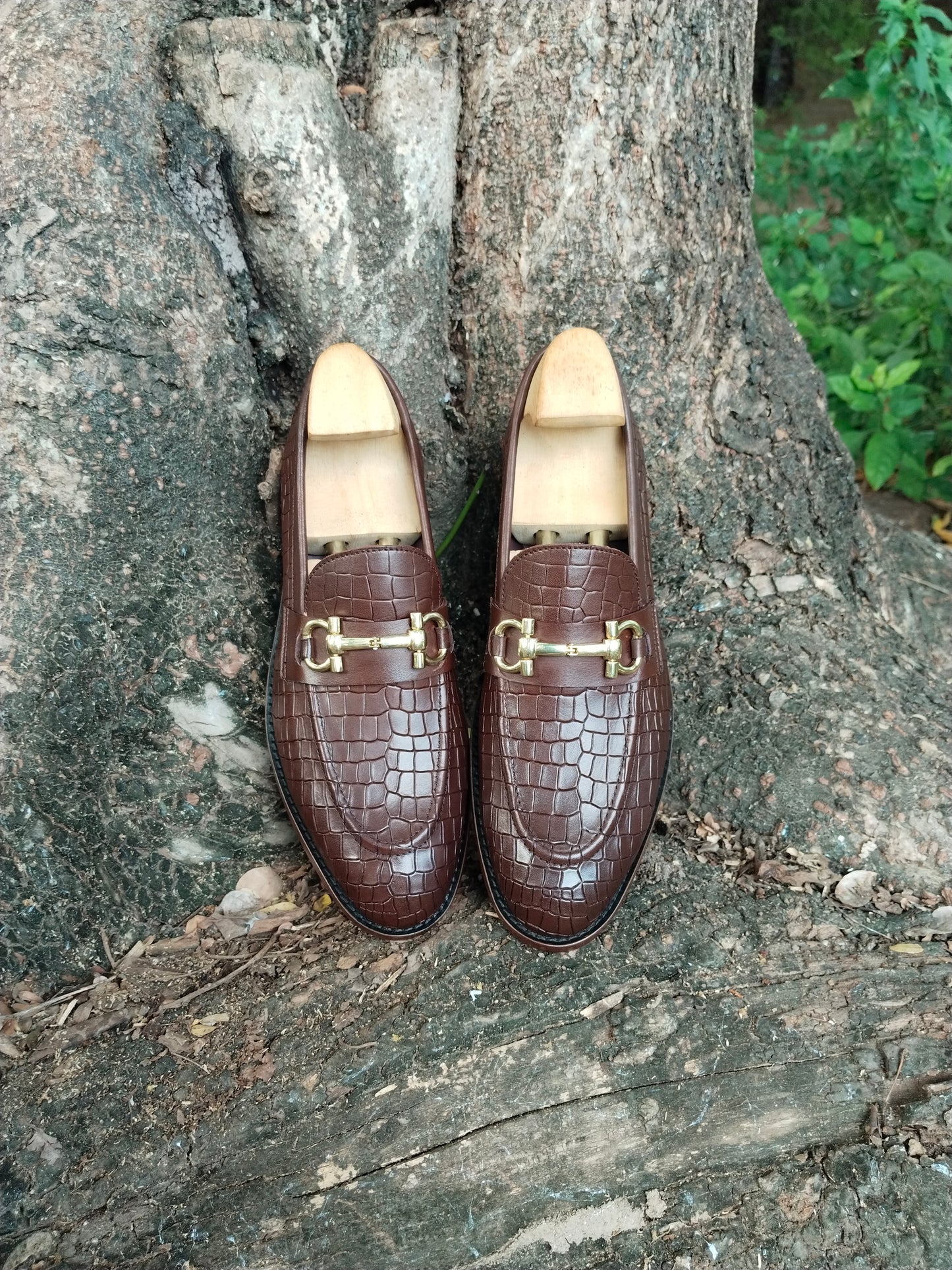 BROWN SLIP ON IN CROCODILE PRINT AND BUCKLE